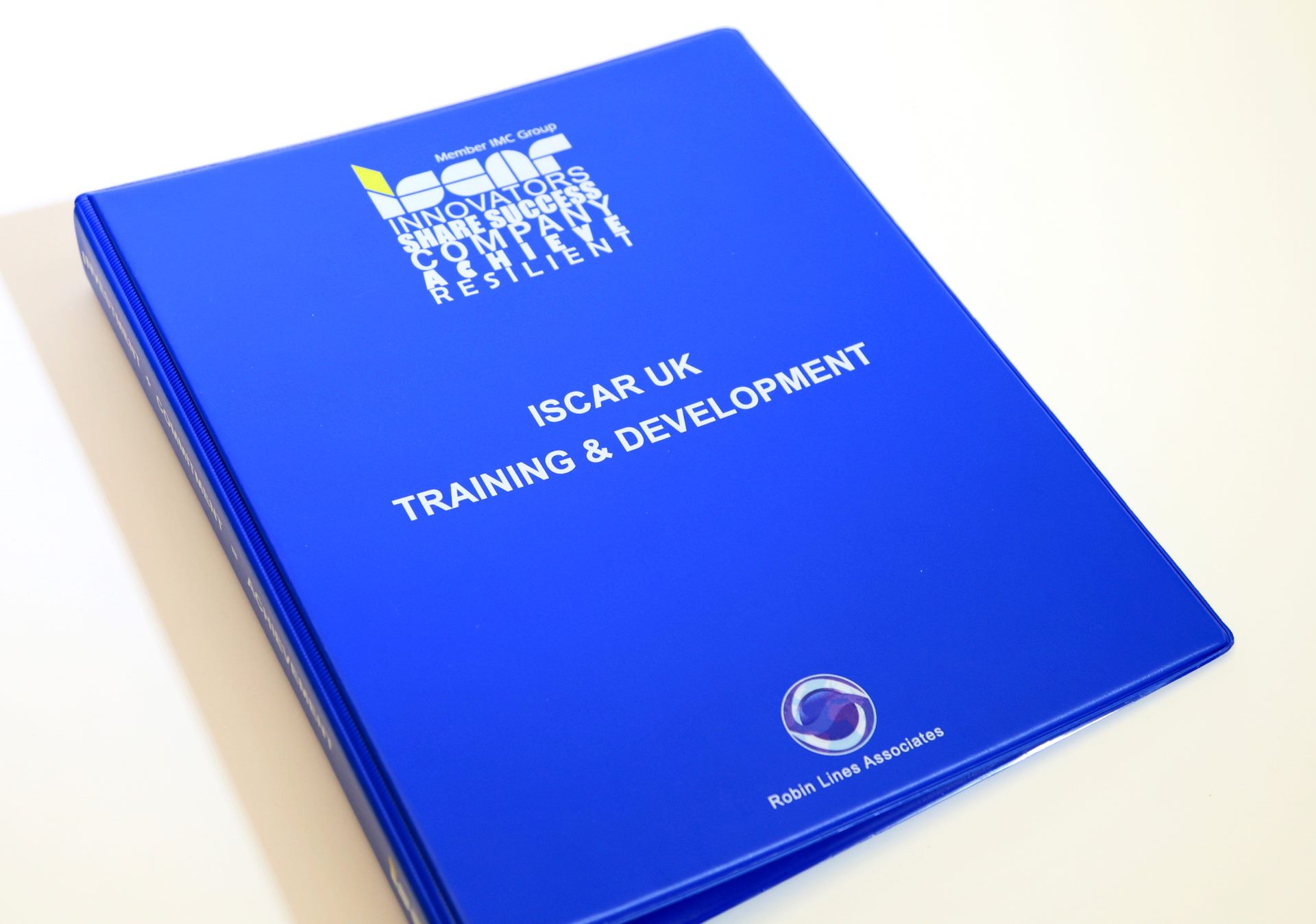 Blue PVC training binder with simple logo and title print