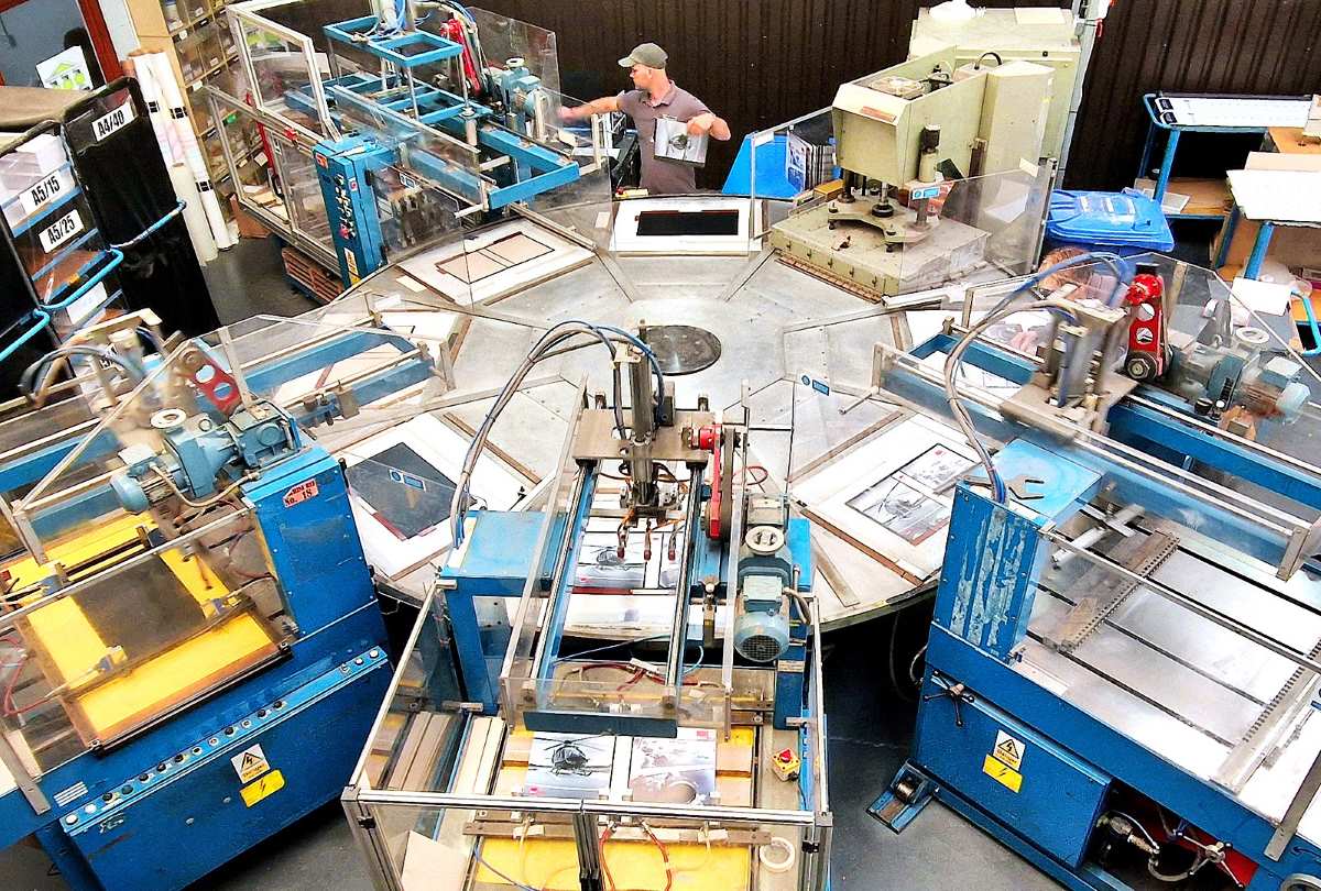 Overhead view of Duraweld’s eight-station high-frequency rotary welding machine in the factory.
