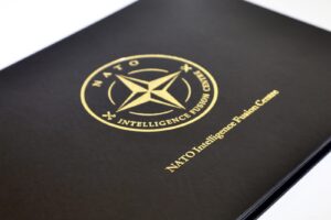 Gold foil blocked logo on a black PVC ring binder